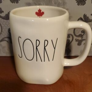 White Ceramic Mug with Sorry Text